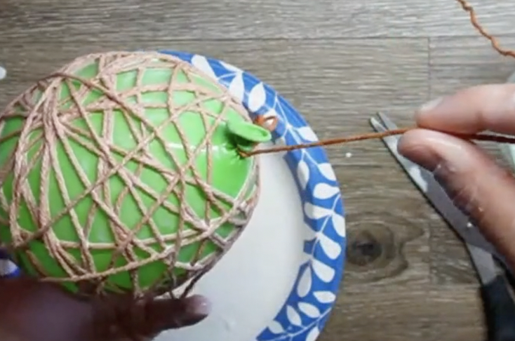 yarn pumpkins with balloons hang balloon to dry completely, put something under