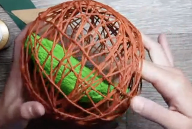 yarn pumpkins with balloons remove balloon